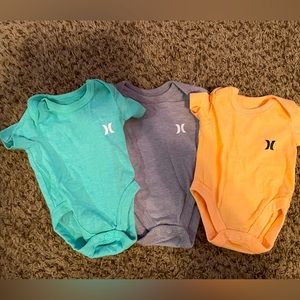 Three Hurley Newborn Size onesie